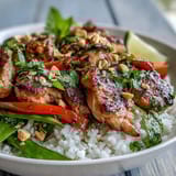 This Thai Chicken Coconut Bowl showcases tender chicken and crisp vegetables served hot.