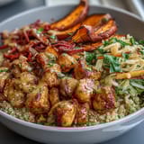 Sliced spiced chicken rests on crunchy red cabbage slaw, all drizzled with tangy hot honey mustard dressing.