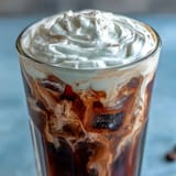 Creamy Cold Brew Coffee with Vanilla Sweet Cream, a refreshing layered delight.